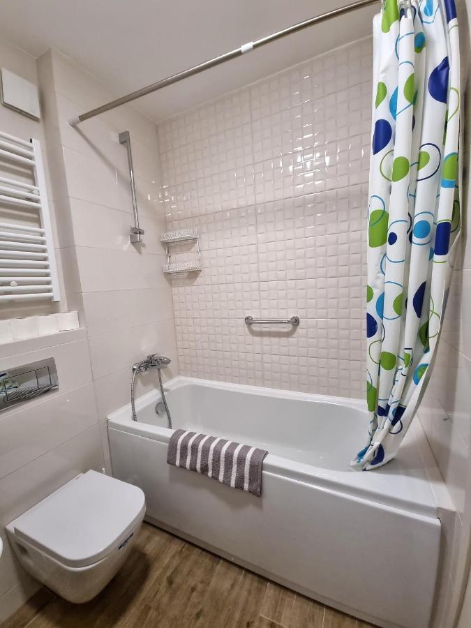 Riverside Apartment พอดโกริกา ภายนอก รูปภาพ
